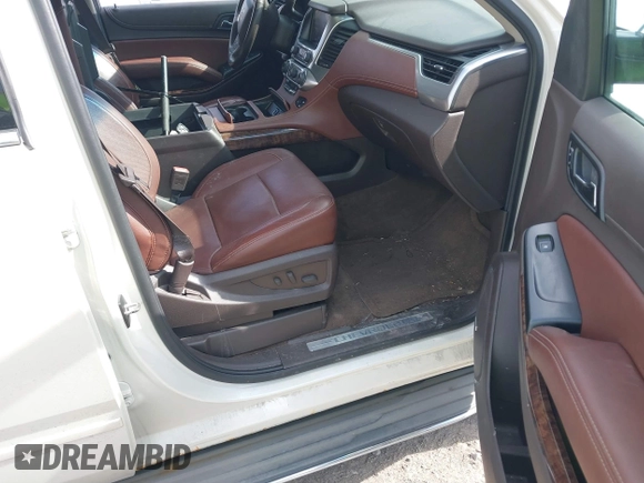 2015 Chevrolet Suburban LTZ with VIN 1GNSKKKC4FR304532, listed as a IAAI auction lot 41899860 with 123,624 mi miles. Bid and sale history available at carsss.com. Image 5.