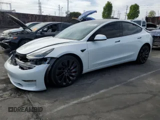 2021 Tesla Model 3 Performance with VIN 5YJ3E1EC6MF996760, listed as a Copart auction lot 52803165 with 19,334 mi miles and Salvage Title. Bid and sale history available at DreamBid. Image 1.