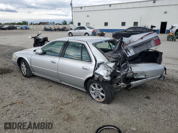 2003 Cadillac Seville Luxury SLS z VIN 1G6KS54Y53U262581, wystawiony jako Copart lot #55597595 z przebiegiem 80 832 mil mil oraz Szkoda całkowita • Salvage title. Historia ofert i sprzedaży dostępna na DreamBid. Obrazek 2.
