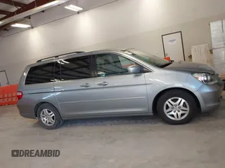 2007 Honda Odyssey EX-L with VIN 5FNRL38737B095747, listed as a IAAI auction lot 42126000 with 178,779 mi miles. Bid and sale history available at carsss.com. Image 13.