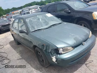 2000 Chevrolet Prizm LSi z VIN 1Y1SK5285YZ407771, wystawiony jako IAAI lot #42240643 z przebiegiem 237 408 mil mil oraz . Historia ofert i sprzedaży dostępna na DreamBid. Obrazek 1.