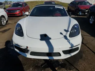 2017 Porsche 718 Boxster z VIN WP0CA2A89HS221297, wystawiony jako Copart lot #68283993 z przebiegiem 9668 mil mil oraz . Historia ofert i sprzedaży dostępna na DreamBid. Obrazek 5.