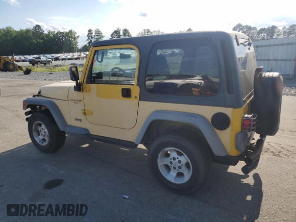 2000 Jeep Wrangler Sport with VIN 1J4FA49SXYP745676, listed as a Copart auction lot 63096755 with 147,226 mi miles and Salvage title. Bid and sale history available at DreamBid. Image 2.