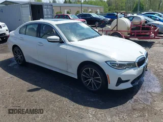 2019 BMW 3 Series 330i xDrive with VIN WBA5R7C54KAJ79214, listed as a IAAI auction lot 42001361 with 103,265 mi miles. Bid and sale history available at carsss.com. Image 1.