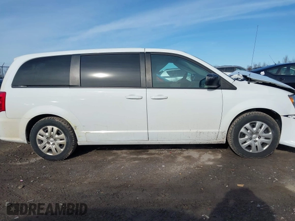 2018 Dodge Grand Caravan SE Plus with VIN 2C4RDGBG0JR138241, listed as a IAAI auction lot 41962762 with 125,644 mi miles and . Bid and sale history available at DreamBid. Image 14.