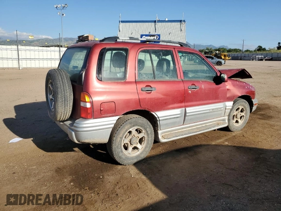 2001 Chevrolet Tracker LT z VIN 2CNBJ634716945832, wystawiony jako Copart lot #61967345 z przebiegiem 136 403 mil mil oraz Szkoda całkowita • Salvage title. Historia ofert i sprzedaży dostępna na DreamBid. Obrazek 3.