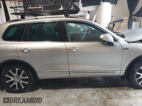 2011 Volkswagen Touareg Exec with VIN WVGFK9BP4BD005986, listed as a IAAI auction lot 41183877 with 109,005 mi miles and . Bid and sale history available at DreamBid. Image 13.