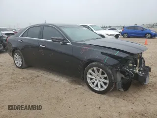 2015 Cadillac CTS with VIN 1G6AP5SXXF0118124, listed as a Copart auction lot 53747665 with 117,800 mi miles and Salvage Title. Bid and sale history available at DreamBid. Image 4.