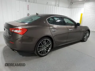 2016 Maserati Ghibli S Q4 z VIN ZAM57RTA4G1168220, wystawiony jako Copart lot #57850955 z przebiegiem 126 378 mil mil oraz Tytuł czysty. Historia ofert i sprzedaży dostępna na DreamBid. Obrazek 3.