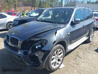 2011 BMW X5 35i with VIN 5UXZV4C51BL740731, listed as a IAAI auction lot 41771257 with 148,638 mi miles. Bid and sale history available at carsss.com. Image 17.