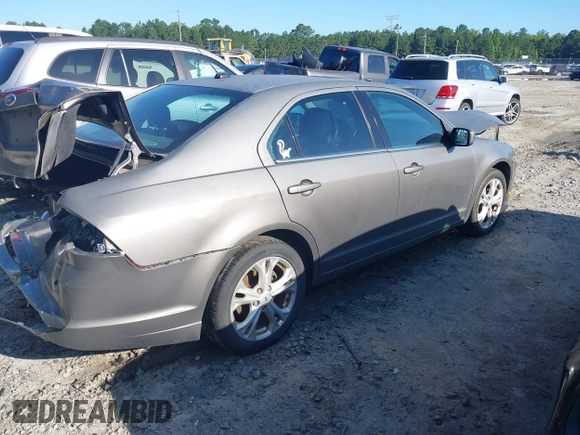2012 Ford Fusion SE with VIN 3FAHP0HA9CR428400, listed as a IAAI auction lot 42556569 with 205,285 mi miles and . Bid and sale history available at DreamBid. Image 4.