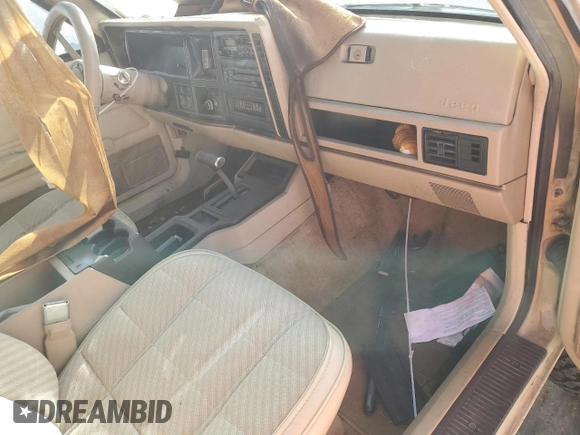 1989 Jeep Cherokee with VIN 1J4FJ38L2KL462983, listed as a Copart auction lot 48012545 with Not provided miles and Salvage title. Bid and sale history available at DreamBid. Image 8.