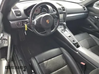 2014 Porsche Boxster S with VIN WP0CB2A85ES140936, listed as a Copart auction lot 60685185 with 64,359 mi miles and Salvage title. Bid and sale history available at DreamBid. Image 8.