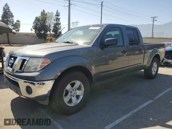 2009 Nissan Frontier LE with VIN 1N6AD09UX9C416211, listed as a Copart auction lot 61655315 with 344,390 mi miles and Salvage title. Bid and sale history available at DreamBid. Image 1.