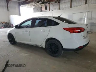 2016 Ford Focus SE z VIN 1FADP3F26GL404670, wystawiony jako Copart lot #52876095 z przebiegiem 80 425 mil mil oraz Szkoda całkowita • Salvage title. Historia ofert i sprzedaży dostępna na DreamBid. Obrazek 2.