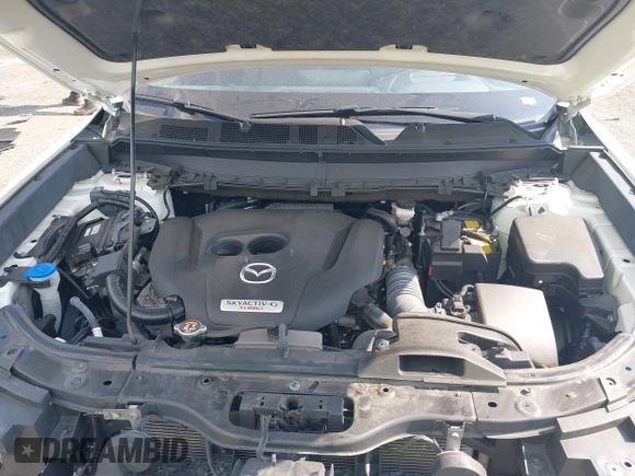 2021 Mazda CX-9 Grand Touring with VIN JM3TCBDY2M0541290, listed as a IAAI auction lot 42216643 with 38,661 mi miles and . Bid and sale history available at DreamBid. Image 10.