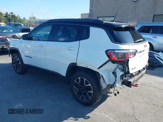 2020 Jeep Compass Trailhawk with VIN 3C4NJDDB4LT144129, listed as a IAAI auction lot 42582688 with 67,112 mi miles and . Bid and sale history available at DreamBid. Image 3.