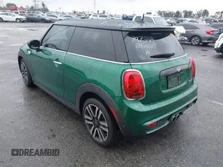 2020 MINI Hardtop Cooper S z VIN WMWXR5C08L2L85651, wystawiony jako IAAI lot #41521346 z przebiegiem 40 863 mil mil oraz . Historia ofert i sprzedaży dostępna na DreamBid. Obrazek 3.