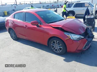 2019 Toyota Yaris L z VIN 3MYDLBYVXKY504148, wystawiony jako IAAI lot #42416557 z przebiegiem 86 149 mil mil oraz . Historia ofert i sprzedaży dostępna na DreamBid. Obrazek 1.