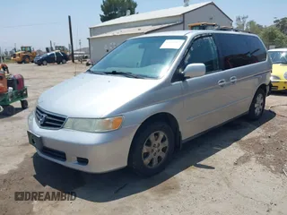 2004 Honda Odyssey EX-L with VIN 5FNRL18774B028164, listed as a IAAI auction lot 42454877 with 135,720 mi miles and . Bid and sale history available at DreamBid. Image 17.