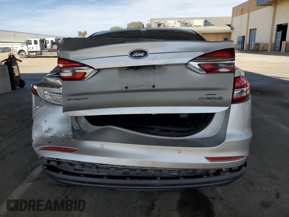 2019 Ford Fusion Hybrid SE with VIN 3FA6P0LU7KR262160, listed as a Copart auction lot 51969555 with 99,699 mi miles and Salvage Title. Bid and sale history available at carsss.com. Image 6.