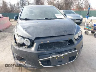 2014 Chevrolet Sonic LT with VIN 1G1JC6SG6E4121407, listed as a IAAI auction lot 41671918 with 137,517 mi miles. Bid and sale history available at carsss.com. Image 6.