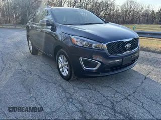 2016 Kia Sorento LX with VIN 5XYPGDA5XGG142632, listed as a IAAI auction lot 42143508 with 146,966 mi miles. Bid and sale history available at carsss.com. Image 1.