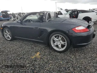 2005 Porsche Boxster z VIN WP0CA298X5U712515, wystawiony jako Copart lot #74030354 z przebiegiem Nie podano mil oraz Szkoda całkowita • Salvage title. Historia ofert i sprzedaży dostępna na DreamBid. Obrazek 2.
