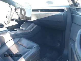 2022 Tesla Model X with VIN 7SAXCBE59NF364984, listed as a IAAI auction lot 41809256 with Not Provided miles and . Bid and sale history available at DreamBid. Image 5.