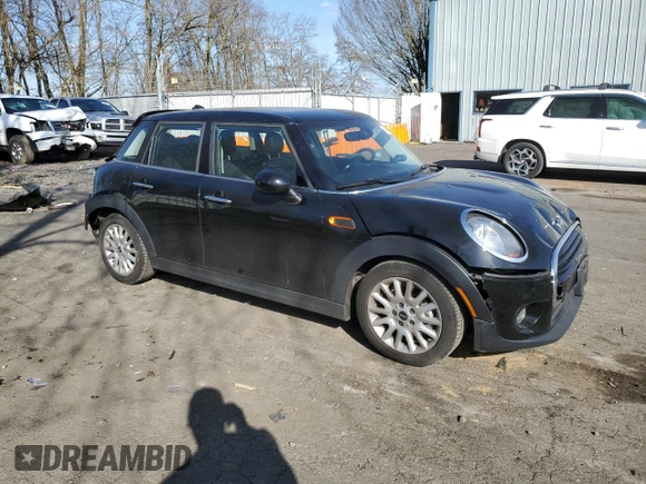 2016 MINI Hardtop 4 Door with VIN WMWXU1C57G2E16741, listed as a Copart auction lot 48392355 with 72,662 mi miles and Salvage Title. Bid and sale history available at DreamBid. Image 4.