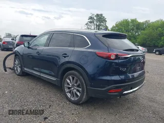 2021 Mazda CX-9 Carbon Edition z VIN JM3TCBDY7M0536005, wystawiony jako IAAI lot #42424129 z przebiegiem 48 005 mil mil oraz . Historia ofert i sprzedaży dostępna na DreamBid. Obrazek 3.
