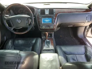 2007 Cadillac DTS V8 z VIN 1G6KD57Y87U140129, wystawiony jako Copart lot #48025875 z przebiegiem 184 526 mil mil oraz Szkody całkowita. Historia ofert i sprzedaży dostępna na DreamBid. Obrazek 8.