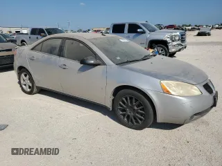 2008 Pontiac G6 z VIN 1G2ZG57N184198212, wystawiony jako Copart lot #70977674 z przebiegiem 118 154 mil mil oraz Czysty tytuł • Clean title. Historia ofert i sprzedaży dostępna na DreamBid. Obrazek 4.