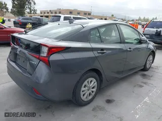 2019 Toyota Prius L Eco with VIN JTDKARFU9K3075219, listed as a IAAI auction lot 42113323 with 218,986 mi miles. Bid and sale history available at carsss.com. Image 4.