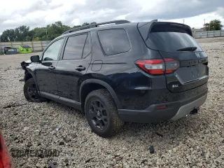 2024 Honda Pilot TrailSport with VIN 5FNYG1H61RB041362, listed as a Copart auction lot 67920164 with 5,511 mi miles and Salvage Title. Bid and sale history available at carsss.com. Image 2.
