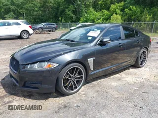 2015 Jaguar XF V6 Portfolio with VIN SAJWA0F74F8U76324, listed as a IAAI auction lot 42158134 with 136,995 mi miles. Bid and sale history available at carsss.com. Image 2.