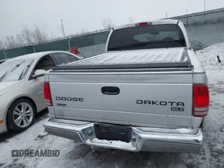 2004 Dodge Dakota SLT with VIN 1D7HG48N34S665027, listed as a IAAI auction lot 41395509 with 128,064 mi miles. Bid and sale history available at carsss.com. Image 16.