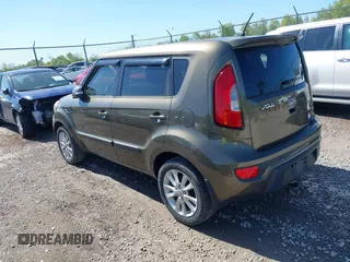 2012 Kia Soul + with VIN KNDJT2A60C7472303, listed as a IAAI auction lot 42126057 with 308,726 mi miles. Bid and sale history available at carsss.com. Image 3.