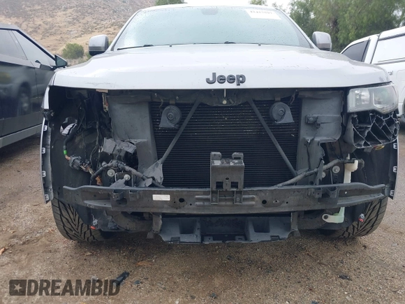 2017 Jeep Grand Cherokee Laredo with VIN 1C4RJEAG0HC702195, listed as a IAAI auction lot 42427597 with 104,403 mi miles and . Bid and sale history available at DreamBid. Image 18.