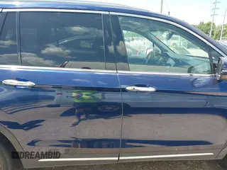 2022 Honda Pilot Touring 7-Passenger with VIN 5FNYF5H61NB019768, listed as a IAAI auction lot 42438780 with Not provided miles and . Bid and sale history available at DreamBid. Image 14.