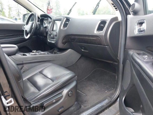 2014 Dodge Durango Limited with VIN 1C4RDJDG0EC310406, listed as a IAAI auction lot 42603939 with 165,439 mi miles and . Bid and sale history available at DreamBid. Image 5.