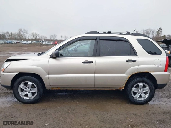 2009 Kia Sportage LX with VIN KNDJE723397628211, listed as a IAAI auction lot 41744526 with 136,811 mi miles. Bid and sale history available at carsss.com. Image 14.