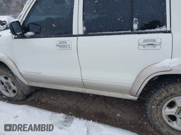 2001 Isuzu Trooper S with VIN JACDJ58X917J16544, listed as a IAAI auction lot 41258932 with 105,249 mi miles and . Bid and sale history available at DreamBid. Image 14.