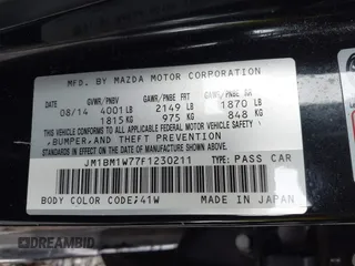 2015 Mazda 3 i Grand Touring with VIN JM1BM1W77F1230211, listed as a IAAI auction lot 41460344 with 106,544 mi miles and . Bid and sale history available at DreamBid. Image 9.