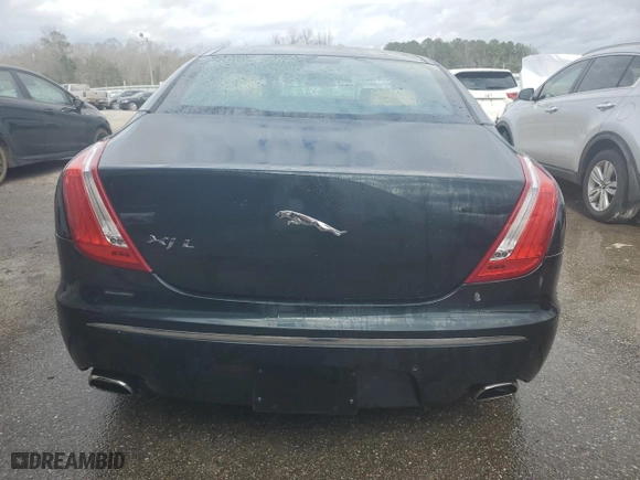 2011 Jaguar XJ with VIN SAJWA2GB2BLV01811, listed as a Copart auction lot 78380094 with 129,243 mi miles and Salvage Title. Bid and sale history available at carsss.com. Image 6.