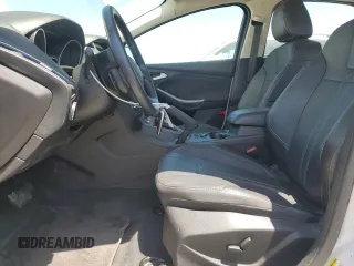 2014 Ford Focus Titanium with VIN 1FADP3N2XEL423320, listed as a Copart auction lot 58709875 with 93,011 mi miles and Salvage title. Bid and sale history available at DreamBid. Image 7.