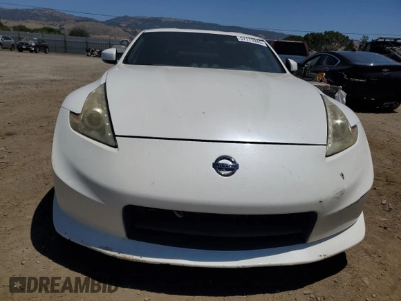 2011 Nissan 370Z Touring z VIN JN1AZ4EH7BM551606, wystawiony jako Copart lot #57173945 z przebiegiem Nie podano mil oraz Szkoda całkowita • Salvage title. Historia ofert i sprzedaży dostępna na DreamBid. Obrazek 5.