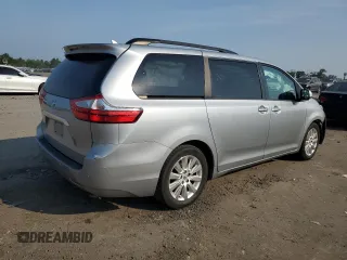 2016 Toyota Sienna XLE z VIN 5TDYK3DC2GS756021, wystawiony jako Copart lot #60636705 z przebiegiem 124 142 mil mil oraz Szkoda całkowita • Salvage title. Historia ofert i sprzedaży dostępna na DreamBid. Obrazek 3.