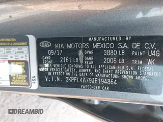 2018 Kia Forte LX with VIN 3KPFL4A79JE194864, listed as a IAAI auction lot 41657793 with 128,256 mi miles and . Bid and sale history available at DreamBid. Image 9.