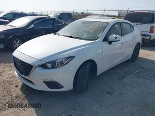 2014 Mazda 3 i Grand Touring with VIN JM1BM1W7XE1151579, listed as a IAAI auction lot 41984987 with 144,589 mi miles and . Bid and sale history available at DreamBid. Image 2.
